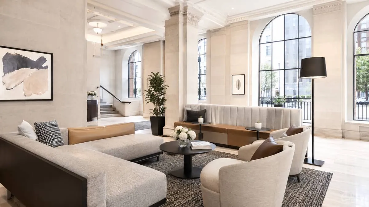 boutique hotel lobby in a historic Ottawa building showing modular lounge seating arrangement with mixed chair and bench