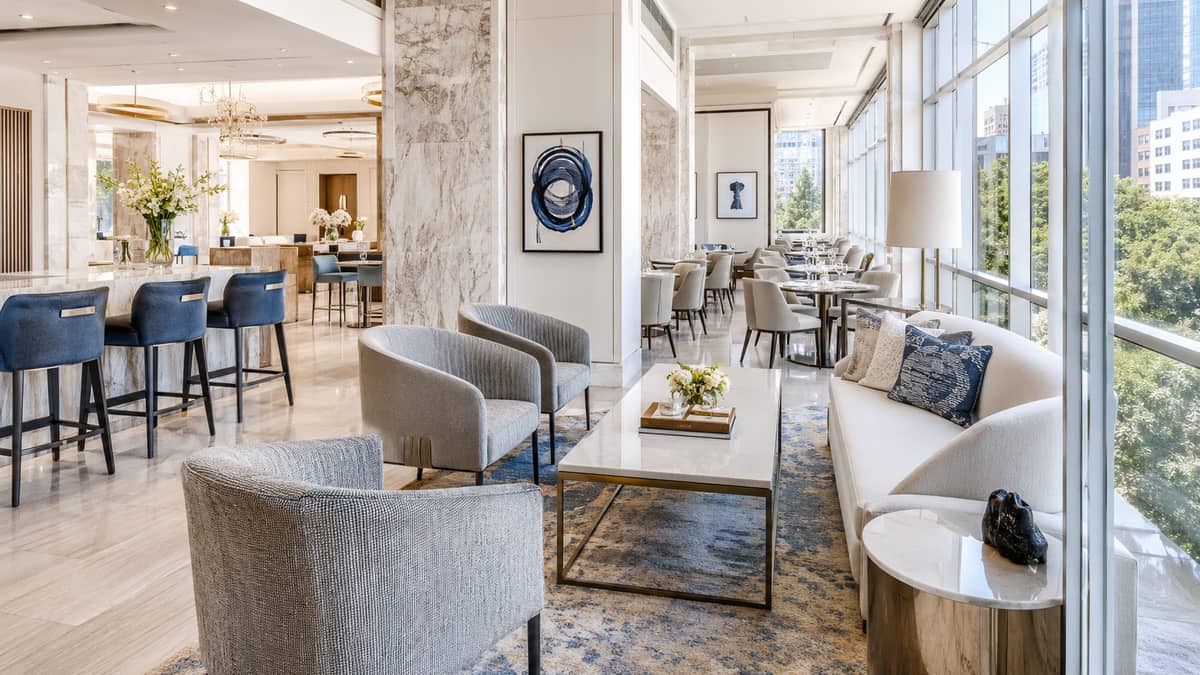 Upholstered lobby seating suited to a West Palm Beach hotel corridor