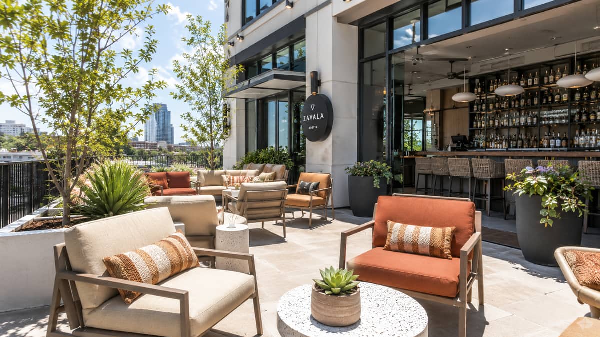 Patio furniture cushion specification for Augusta outdoor dining showing solution-dyed acrylic fabric with commercial-density foam