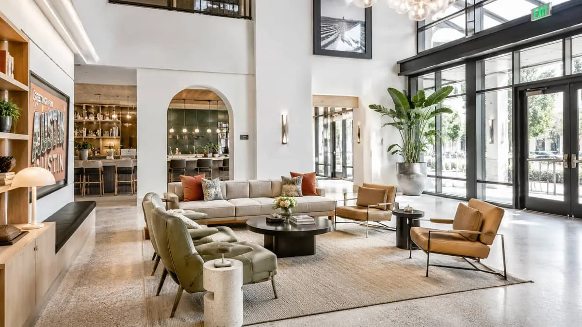 Atlanta hotel lobby furniture procurement showing COM fabric sample approval process with contract supplier for boutique Midtown property opening
