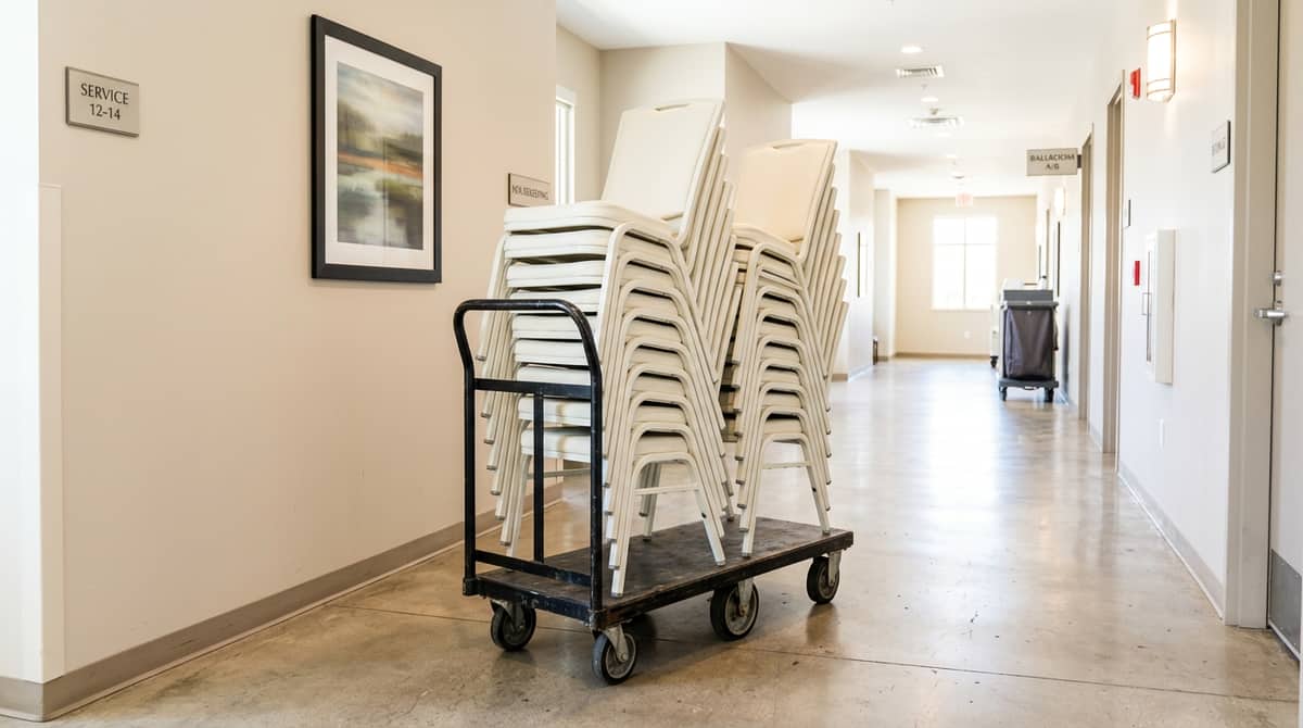 Banquet chair specification comparison for Sioux Falls event venue showing Chiavari chair for downtown wedding market and padded steel stacker for convention corridor
