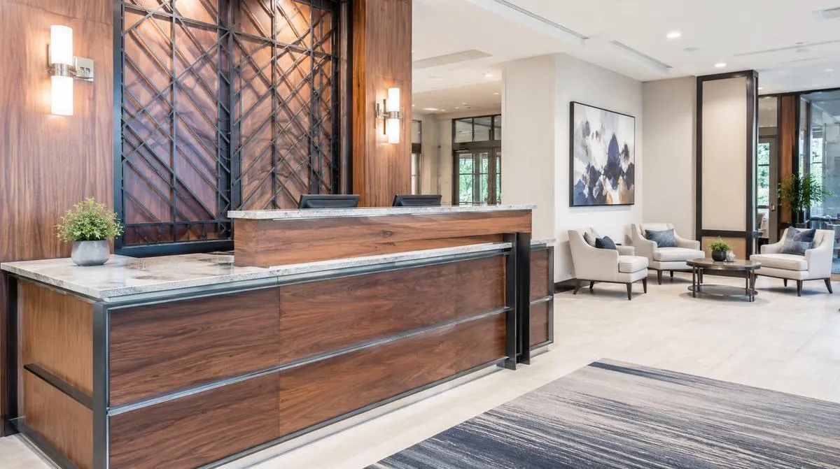 Hotel lobby lounge seating with contract-grade upholstery and hardwood frame construction suited to high-traffic common areas near downtown Wichita