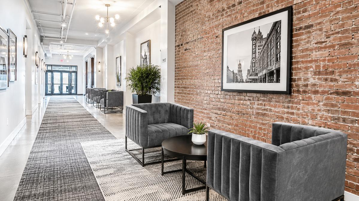 Contract-grade hotel guestroom furniture with reinforced frame construction and commercial upholstery in a Jackson property