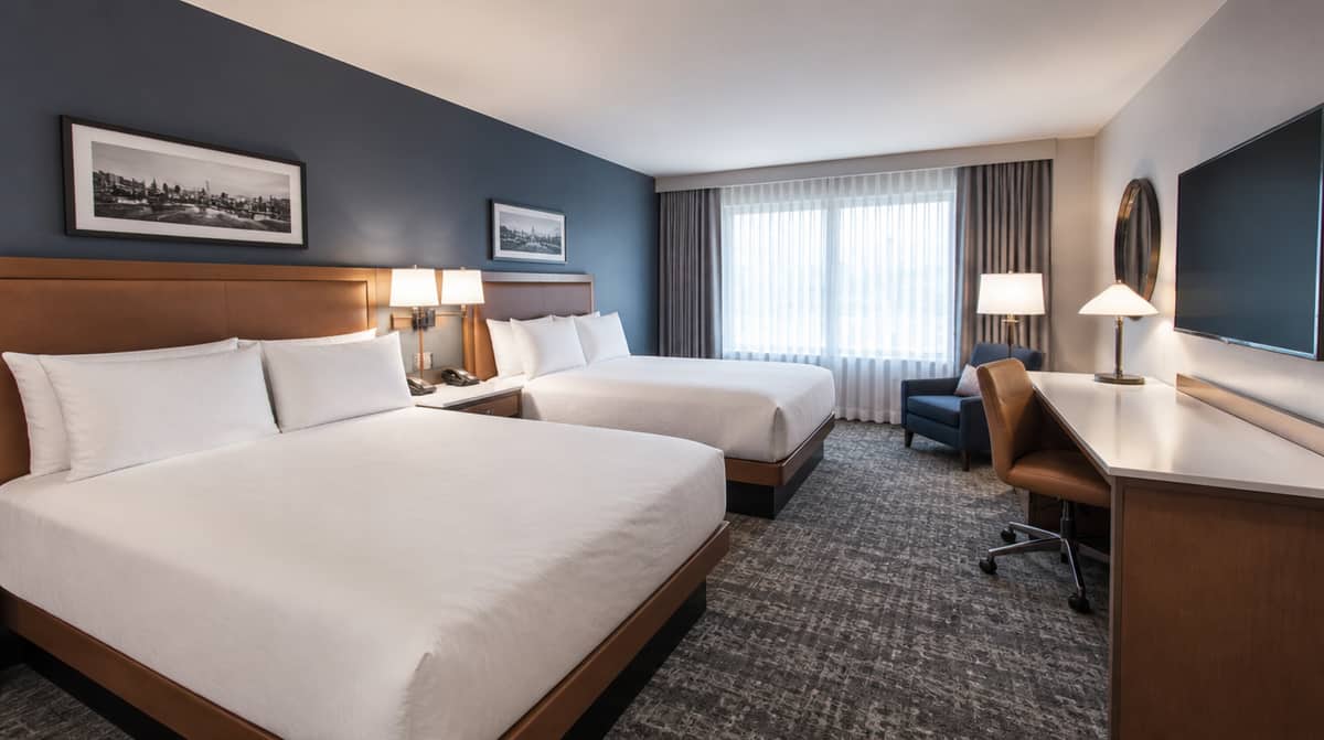 Hotel renovation furniture staged by floor in an occupied Manchester property showing phased FF&E delivery coordination