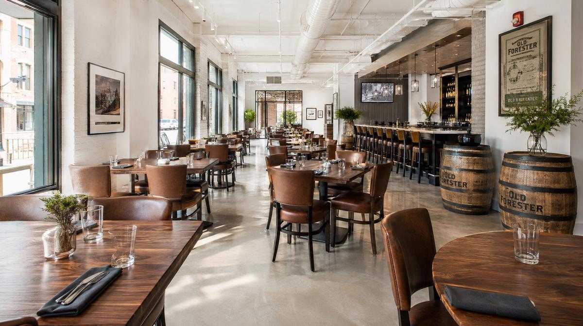 Contract-grade restaurant dining chairs in a Lexington commercial dining room showing reinforced frame construction and durable upholstery